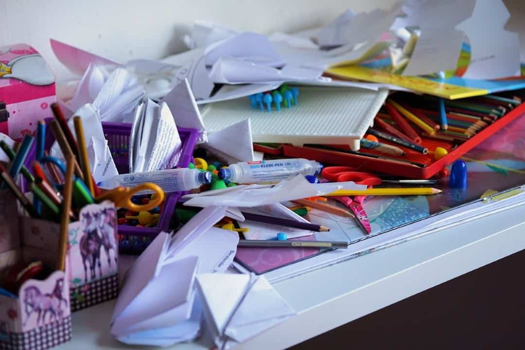 messy desk for smackdown on paper clutter