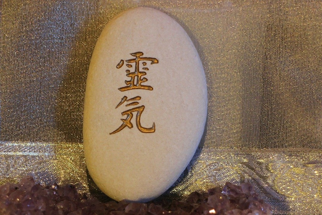 rock with a reiki symbol on it