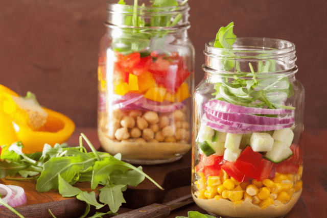 Putting together a salad in a jar in the correct order
